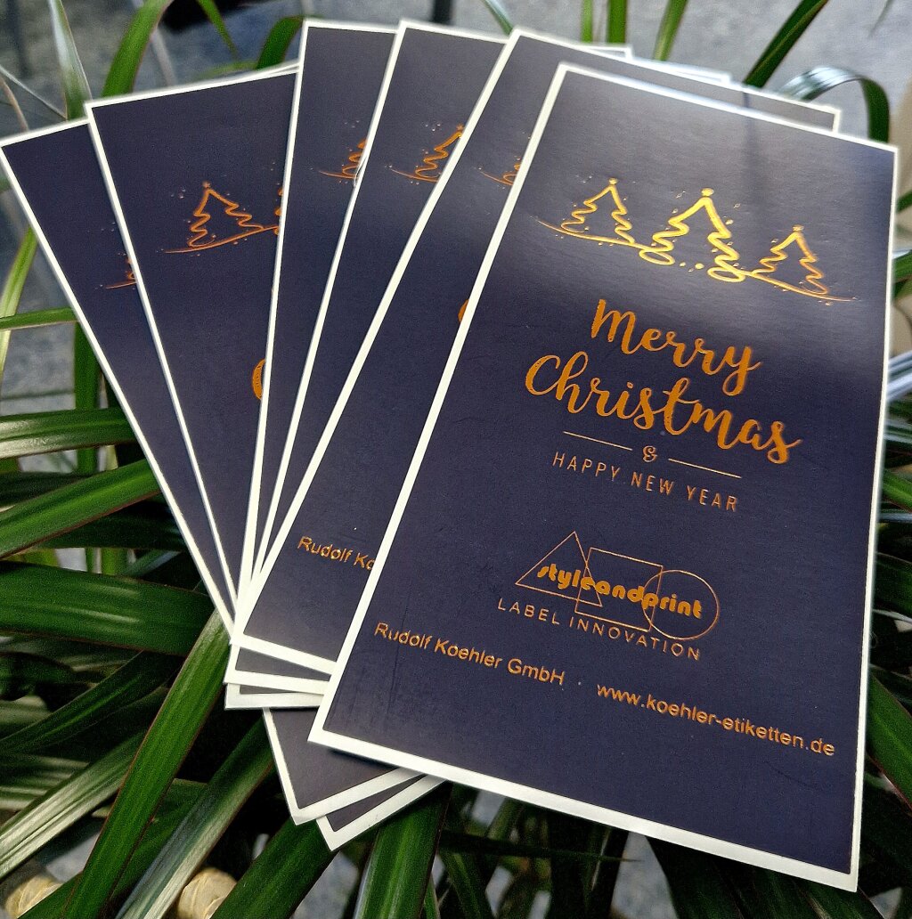 Einzeletiketten mit Veredelung: Heißgeprägte Goldfolie auf unseren Weihnachtskarten.